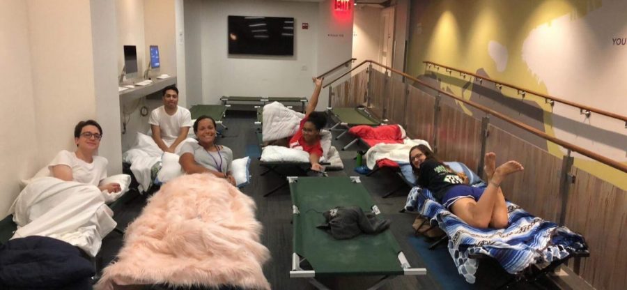 Rubin residents lie on temporary cots during the heat wave. 