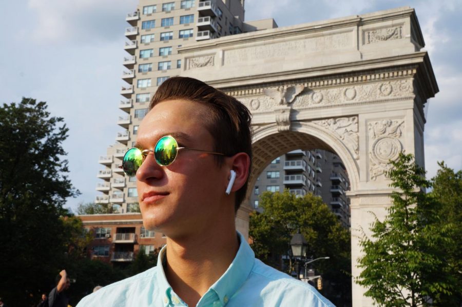 A student wears AirPods.