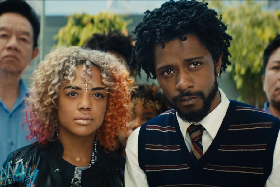 Tessa+Thompson+and+Lakeith+Stanfield+in+Sorry+To+Bother+You.