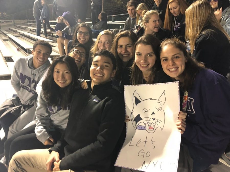 NYU students support the mens and womens soccer teams at a doubleheader on Oct. 12. (Photo by Belle Lu)
