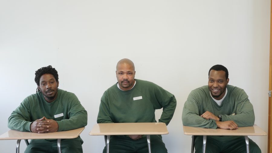 Bruce Mobley (far right) and two of his classmates in the Prison Education Program.