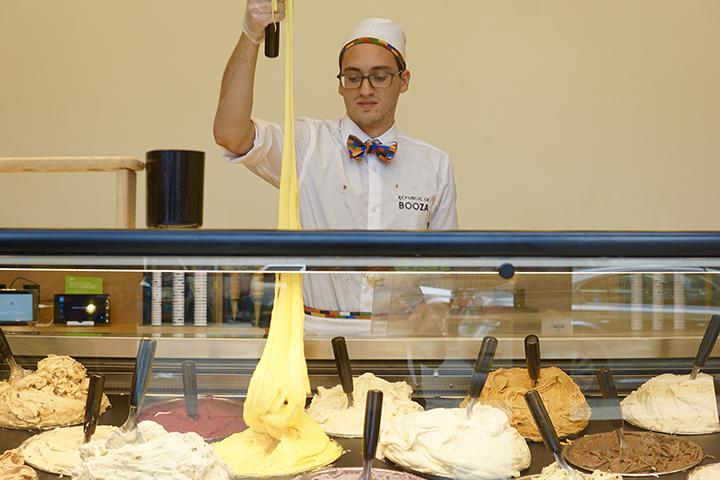 A Booza employee stretches out some ice cream to scoop. (Photo by Jorene He)