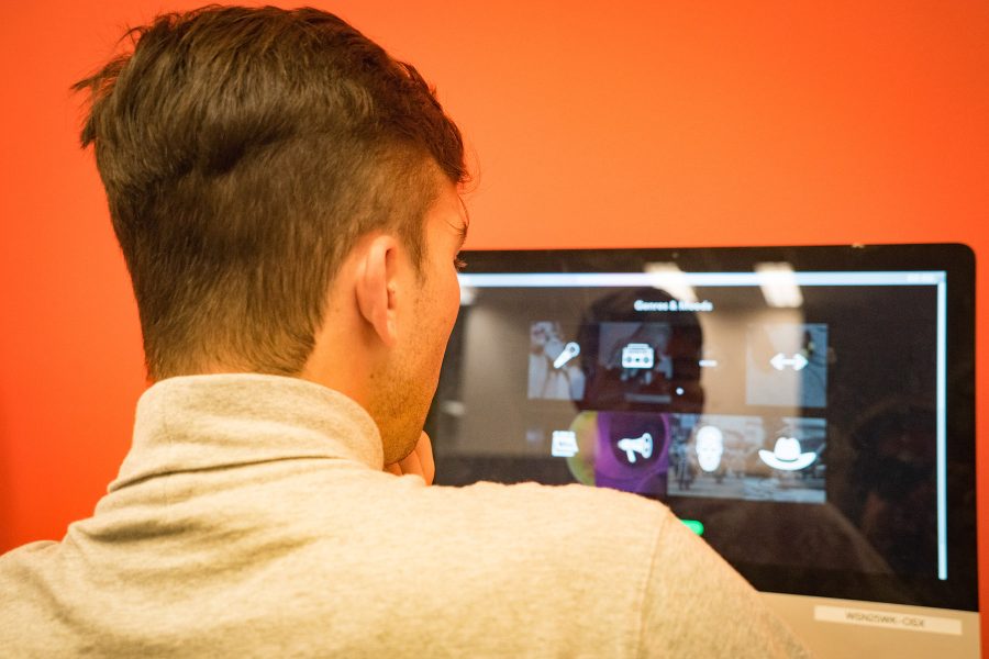 Student browses through Spotify’s homepage. Spotify has recently made itself much more accessible to independent artists, including students. (Photograph by Alana Beyer)