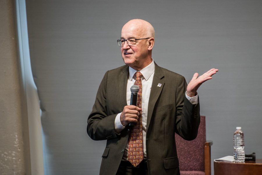 NYU President Andrew Hamilton speaks at a Fireside Chat event. At his Presidential Welcome to the Class of 2023, Hamilton made alluded to a rivalry with Columbia University, which some first-years felt was unnecessary. (Photo by Sam Klein)