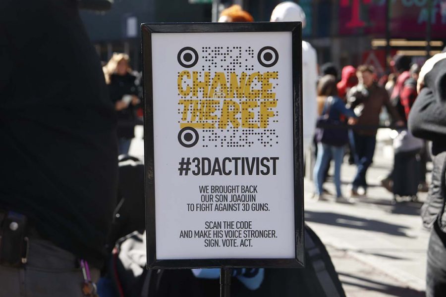 A sign in Times Square allows you to scan a barcode to demand regulations on 3D-printed guns. The sign and statue titled ‘Guac is Back,’ was installed by the ALMA Advertising Agency and the Change the Ref foundation, founded by Manuel Oliver and the as a dedication to his late son Joaquin “Guac” Oliver, a victim of the Marjory Stoneman Douglas school shooting. (Photo by Tianne Johnson)