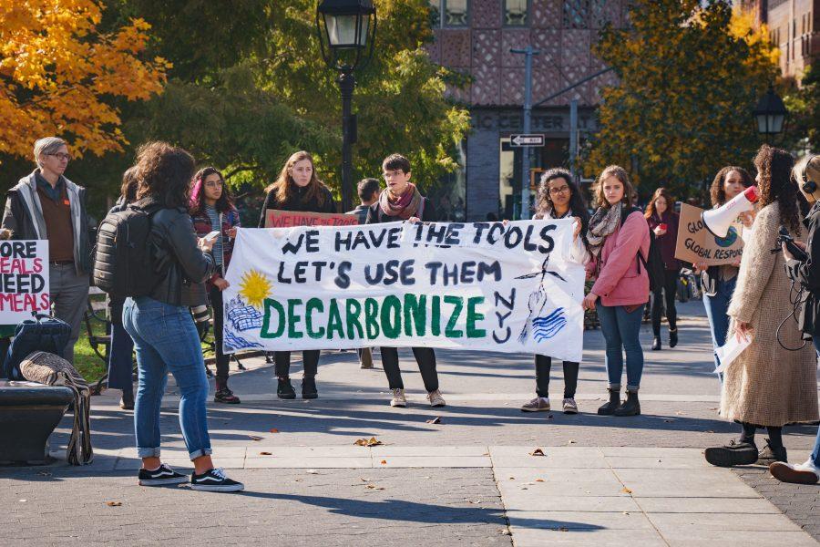Students from NYU Divest called for the university to become carbon neutral at protests on campus last year. (Photo by Tony Wu)