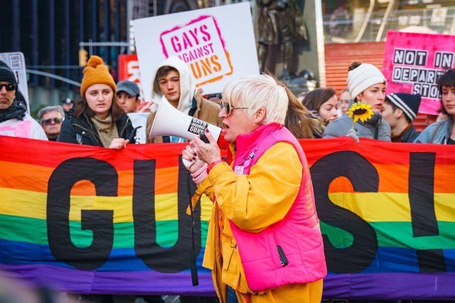 Brigid McGinn speaking during the protest. McGinn is a member of Gays Against Guns, the organizer of the rally. (Photo by Tony Wu)