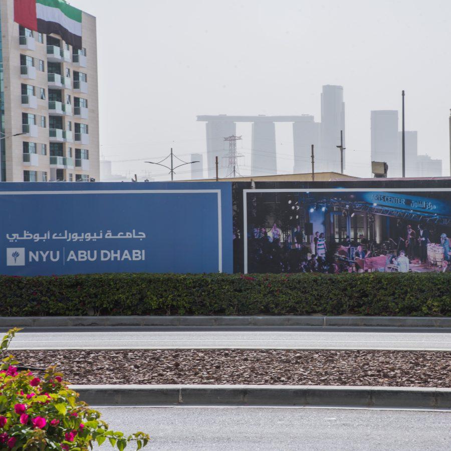 Construction on the NYU Abu Dhabi campus with the city skyline in the background. (Photo by Sam Klein)