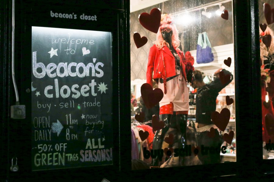 A look through the windows of Beacons Closet, a used-clothing store with several locations in the city. (Staff Photo by Julia McNeill)