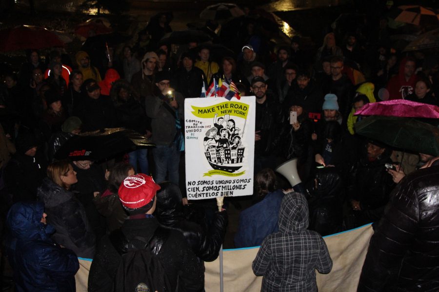 Citizens gather in Long Island City to protest the movement of Amazon into the area. (Staff Photo by Julia McNeill)