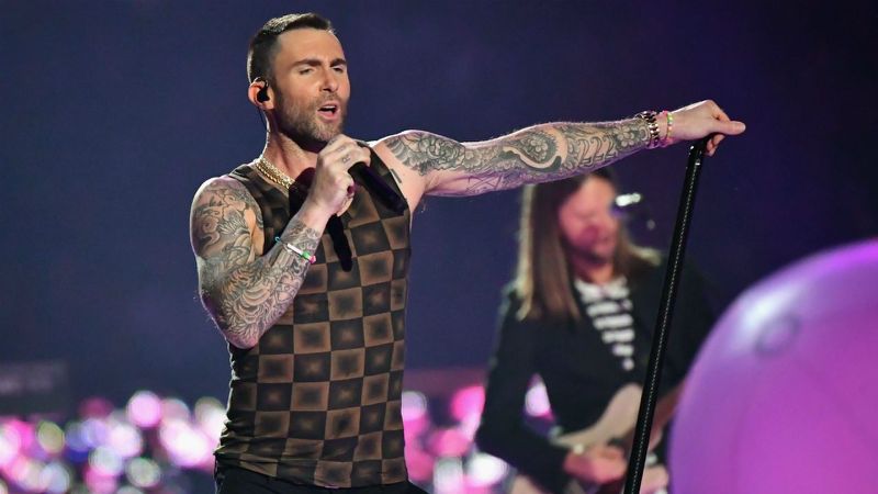 Maroon 5 performing in the Super Bowl Half Time Show (via Yahoo Entertainment)