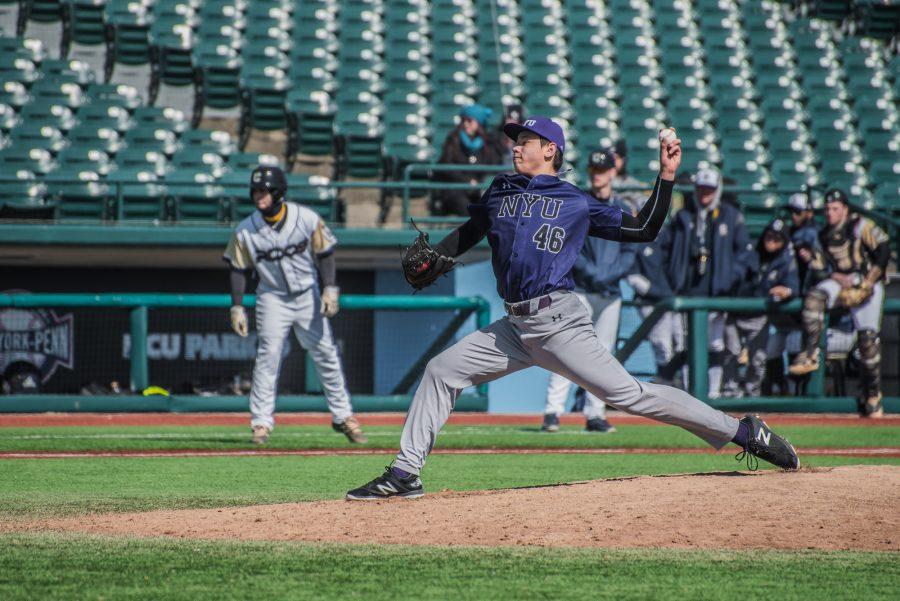 First-year John Gassler pitches in a game against SUNY Canton on March 11. (Photo by Sam Klein)