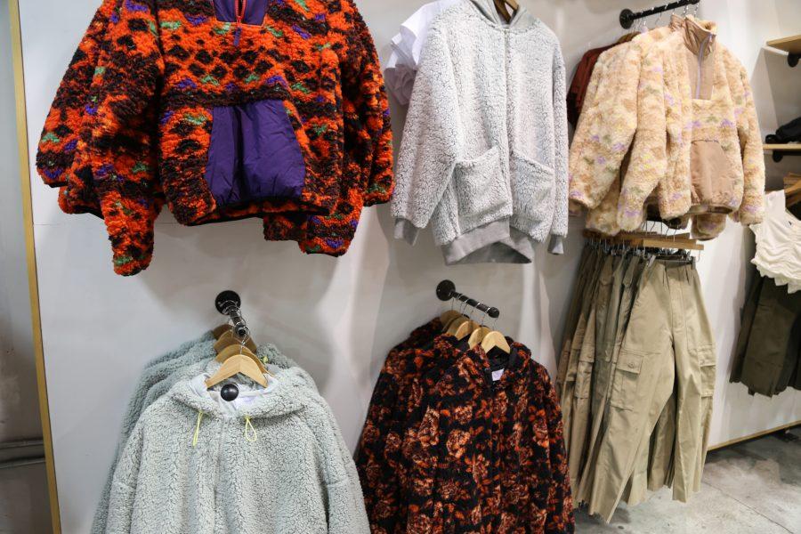 Colorful teddy coats line the walls of Urban Outfitters on 3rd Avenue. (Staff Photo by Julia McNeill)