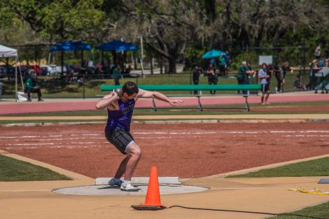 First-year Owen Mountford competes in the shotput in a meet on March 24. Mountford won the discus at the TCNJ Invitational Saturday with a mark of 41.32m. (Photo by Sam Klein)