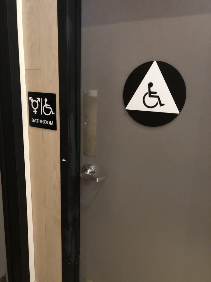 A wheelchair-accessible bathroom doubles as a gender neutral option (via Wikimedia Commons).