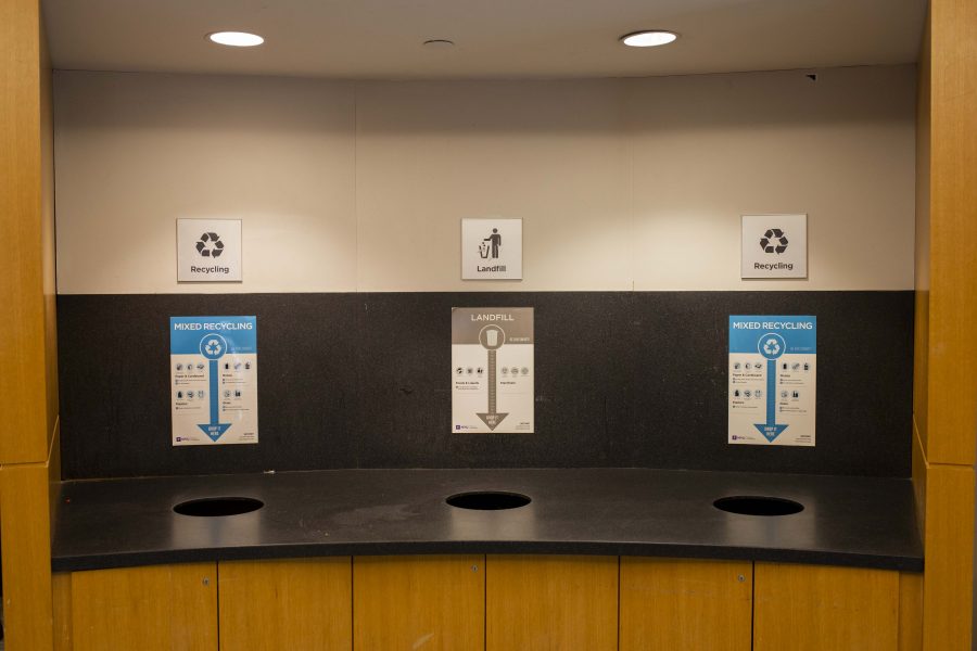 On the Bobst Lower Level, waste receptacles are clearly marked for proper for landfill items and mixed recycling. Single-stream recycling is when various types of waste like aluminum and plastic are disposed of in one bin rather than separately. (Photo by Katie Peurrung)