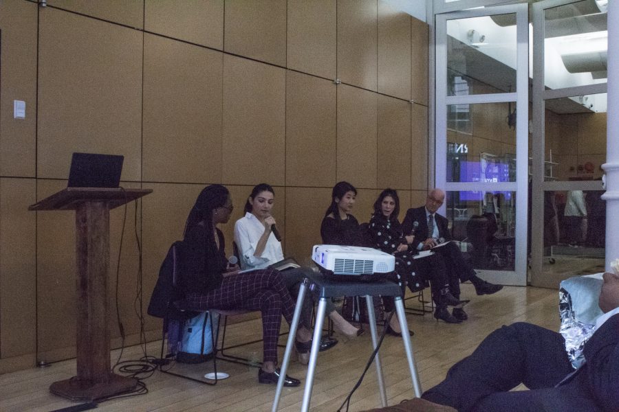 Panelists at the town hall discuss wellness resources for students. (Photo by Victor Porcelli)