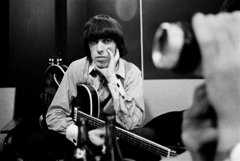 Former Rolling Stone bassist Bill Wyman pictured with instrument. (via Susan Norget Film Promotion)