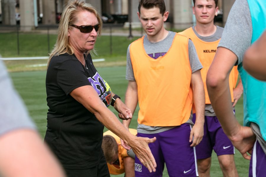NYU+men%E2%80%99s+soccer+coach+Kim+Wyant+directs+players+on+the+field.+%28Staff+Photo+by+Marva+Shi%29