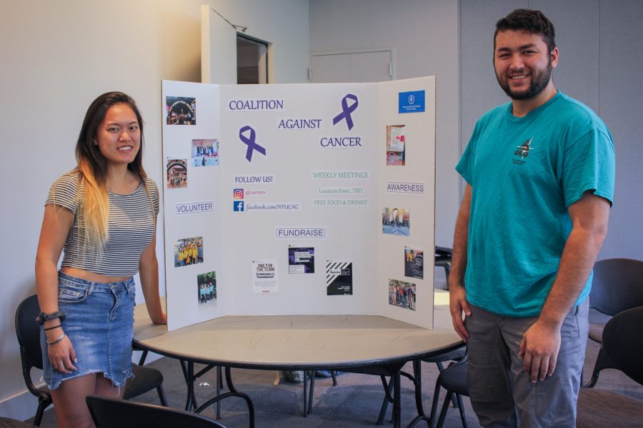 Brianna Fu (President) and Paul Roessling (General Member) of the Coalition Against Cancer club at NYU. (Photo by Ryan Pegollo)