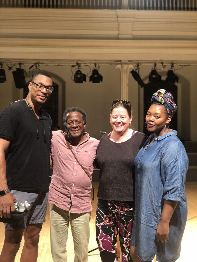 Mahogany L. Browne (right), author of Black Girl Magic and a reader for the event, stands with the founders of Immigrant Families together. (via Twitter)
