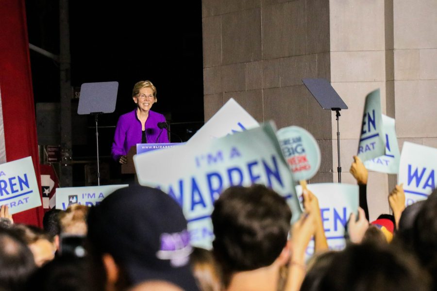 Elizabeth Warren speaks to a crowd of supporters holding ‘I’m a Warren Democrat’ signs. (Photo by Ishaan Parmar)