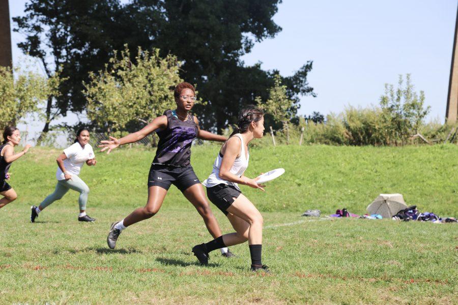 A player looks to pass the frisbee to a teammate during practice. The Violet Femmes, NYUs club womens ultimate frisbee team, compete in regional tournaments throughout the semester. (Staff Photo by Julia McNeill)