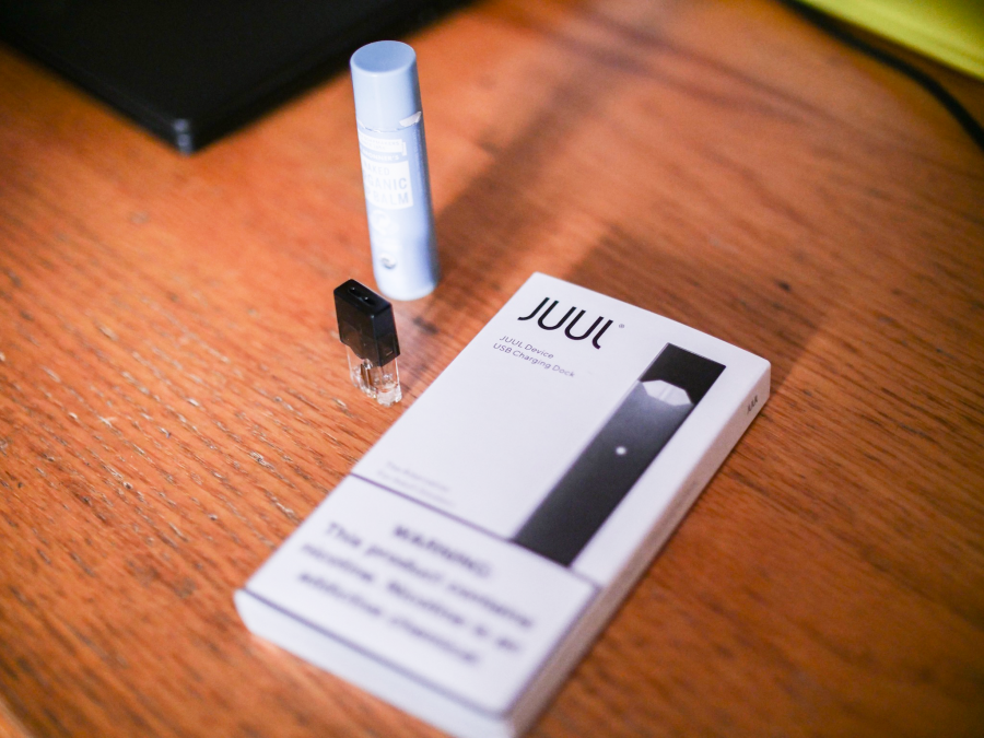 With+new+regulations+on+e-cigarettes+and+ban+on+flavored+Juul+products%2C+students+discuss+the+danger+of+e-cigarettes.+%28Photo+by+Aidan+Singh%29