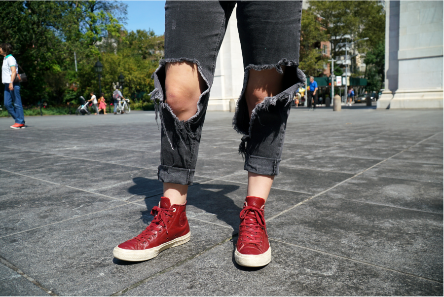 Jenna Roth, Tisch first-year, dressed in ripped jeans and high top leather Converse. (Staff Photo by Min Ji Kim)
