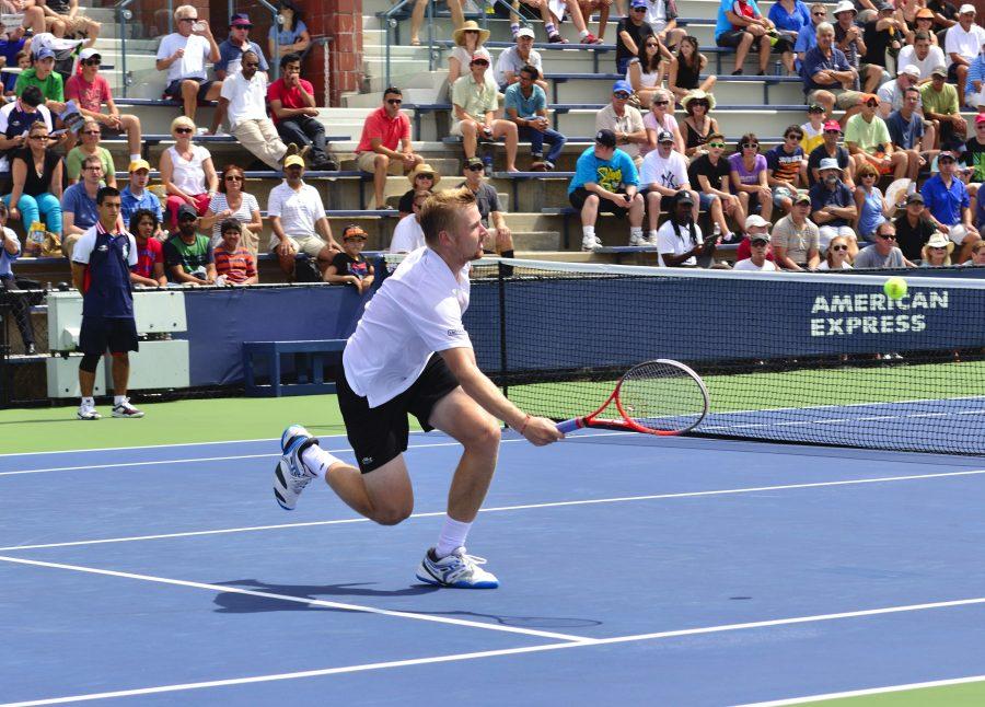 Andrey Gobulev, a male tennis player, returns a serve during the US Open. (via Wikimedia)