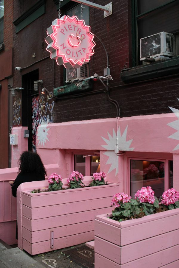 The exterior of Pietro Nolita reflects its pink interior. (via Flickr)