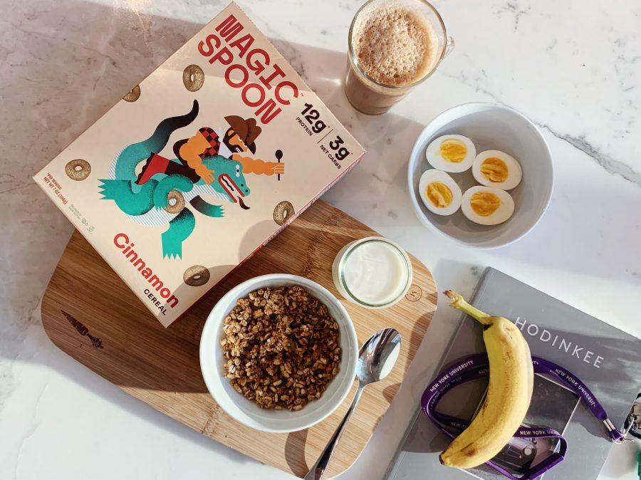 A breakfast scene with a box of Magic Cereal on the table and a bowl of granola besides it. (Photo by Li-Chun Pan)
