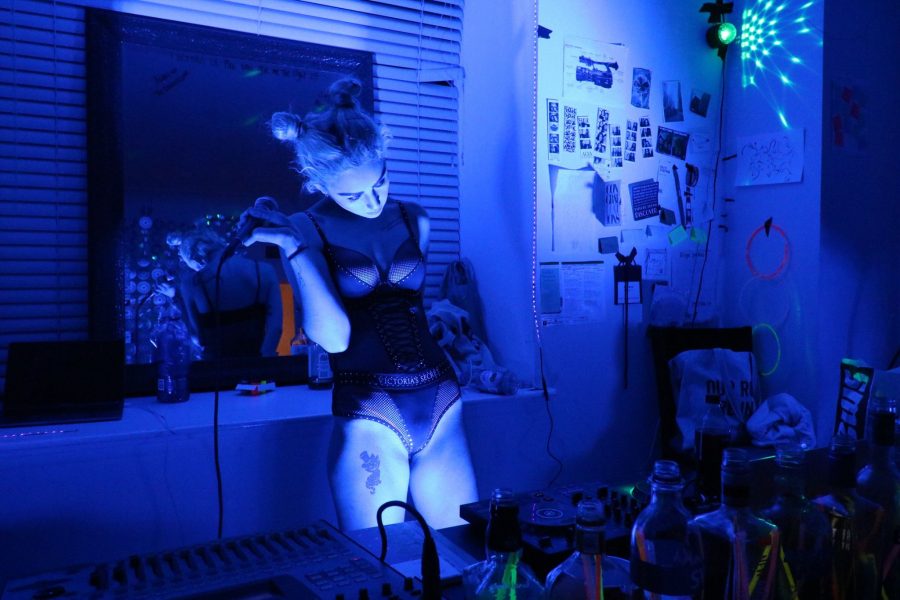 DJ Kali performs an intimate set in  April 2018. Before graduating to larger warehouse venues, Kali practiced throwing raves in her friends midtown apartment. (Photo Courtesy of Matthew Herbert) 
