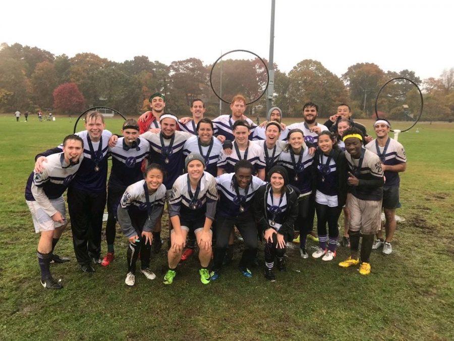 The NYU Quidditch team poses for a photo after its first-ever Northeast Regional Championship win. The team defeated Tufts University by a score of 180*-100 in the final. (Courtesy of NYU Quidditch)