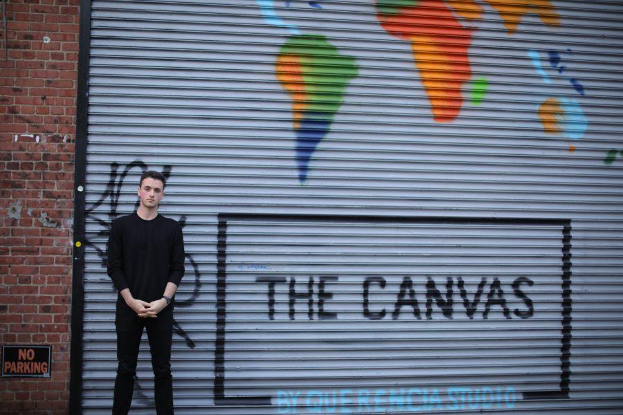 Devin Gilmartin poses outside The Canvas by Querencia Studio building in Williamsburg. Here, sustainable fashion and art companies can use the floorspace for their endeavors. (Photo by Celia Tewey)