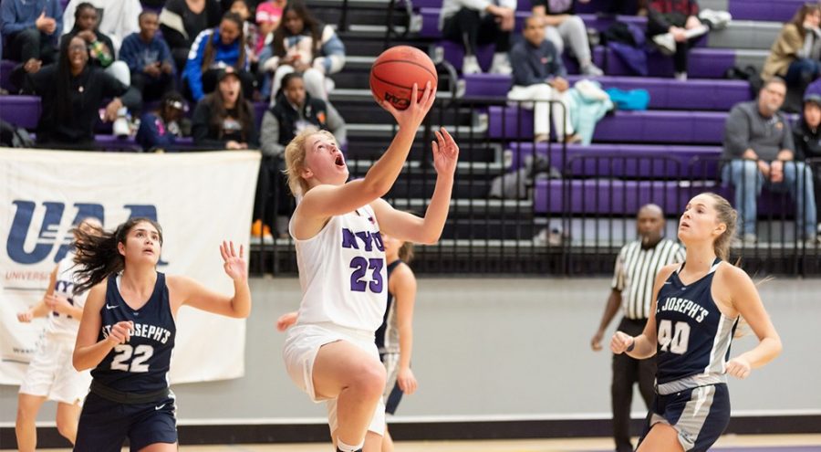 Jenny+Walker%2C+first-year+in+Steinhart%2C+finished+with+a+season-high+11+rebounds.+NYU+womens+basketball+team+defeated+Baruch+College+103-50+on+Wednesday+afternoon%2C+November+27.+%28Via+NYU+Athletics%29