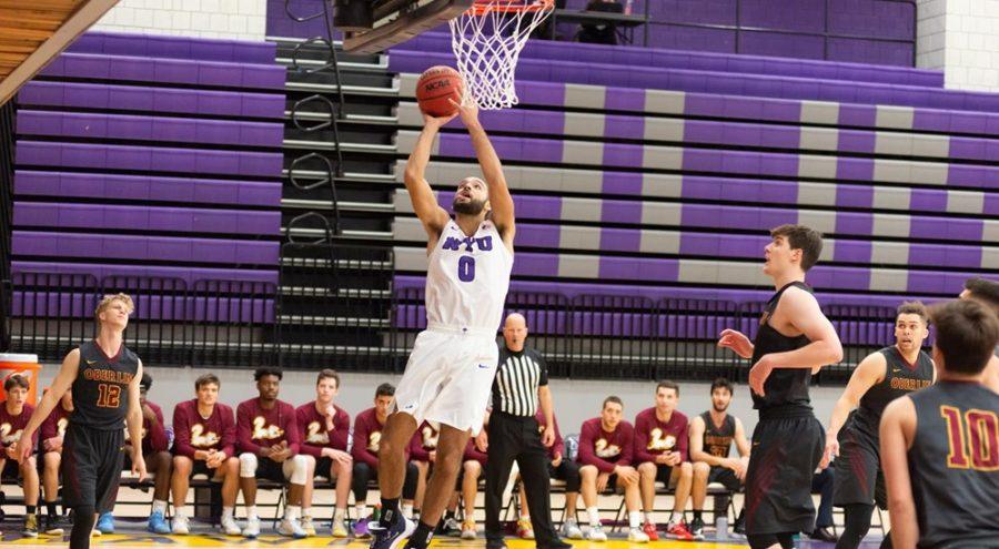 Ethan Feldman, senior in CAS,  scored a team-high 16 points in the Championship Game of the Hampton Inn Jim Beaudry Classic. (Via NYU Athletics)
