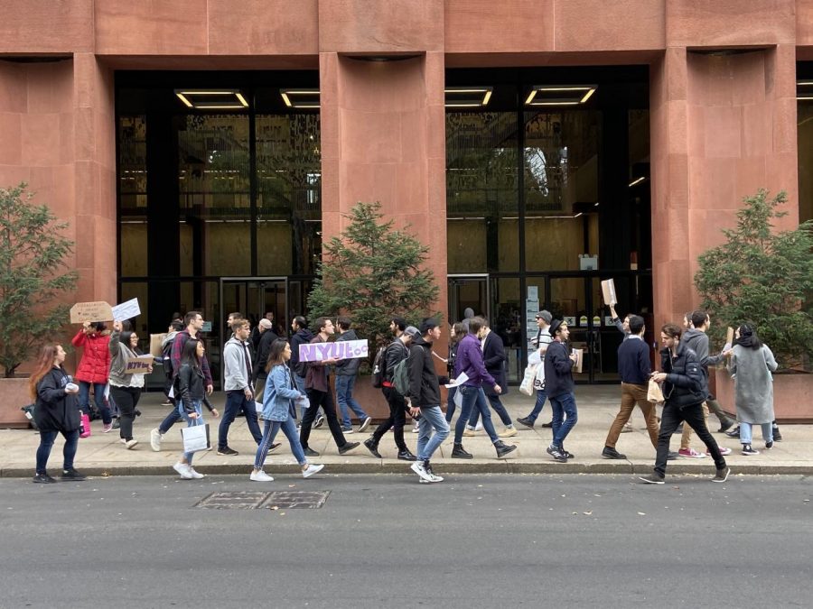 Students march outside Bobst Library in  response to the universitys decision to keep on Professor Avital Ronell. (Photo by Mina Mohammadi)