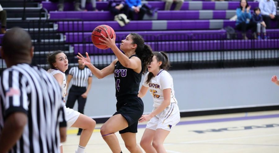 With a career high of points per game, Junior Guard Janean Cuffee is leading the women’s basketball team in a new season. (Photo via NYU Athletics) 
