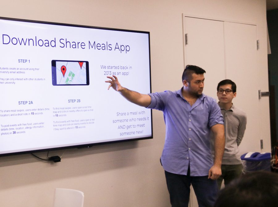 Members from Share Meals present their application at the Town Hall. Downloading this app is an initiative you can take to improve food security at NYU. (Staff photo by Alex Tran)