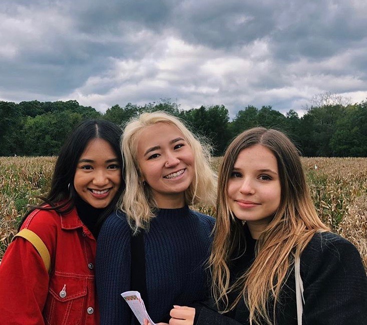 CAS juniors Lise Swain and Han Nguyen posing for a picture with sophomore Kathrine Serebrianski. The trio became friends after an outing in Smorgasburg, and now are inseparable as roommates. (Photo by Kritima Lamicchane)