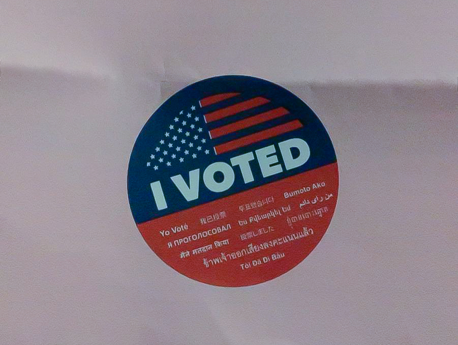 Variations of “I Voted” stickers are distributed at voting centers during election days.  An Election Day resolution was struck down in the University Senate. (Photo by Katherine Chan)
