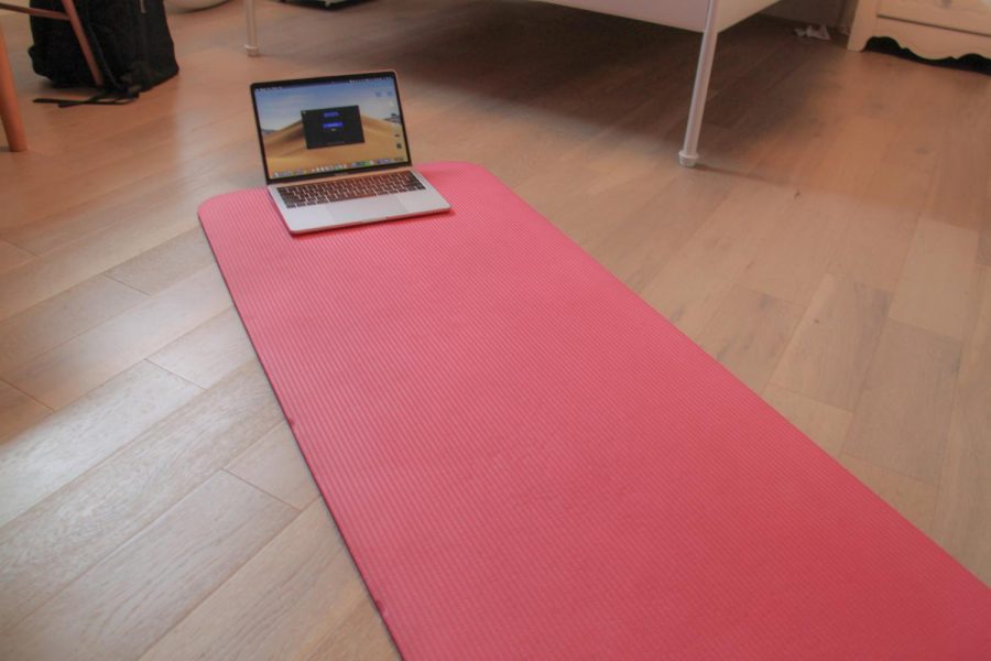 Amidst the chaos of remote learning, GCASL’s free yoga sessions have also shifted onto Zoom. Students reflect on the advantages and disadvantages of yoga at home. (Staff Photo by Alexandra Chan)