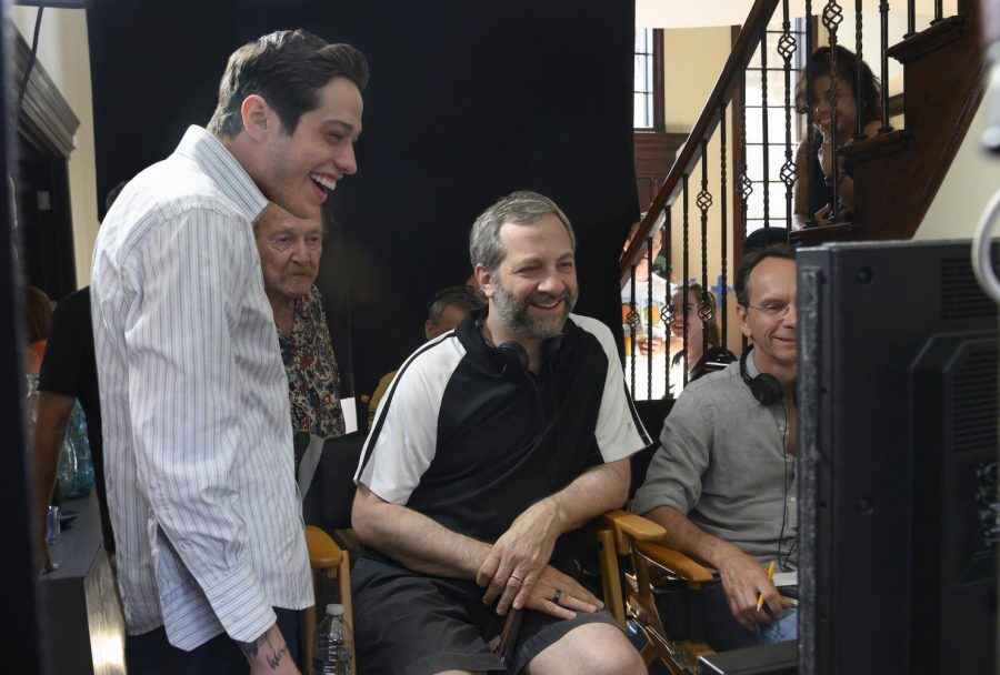 (From left) Pete Davidson and director Judd Apatow with crew members on the set of "The King of Staten Island." (Photo by Kevin Mazur / Courtesy of Universal Pictures)