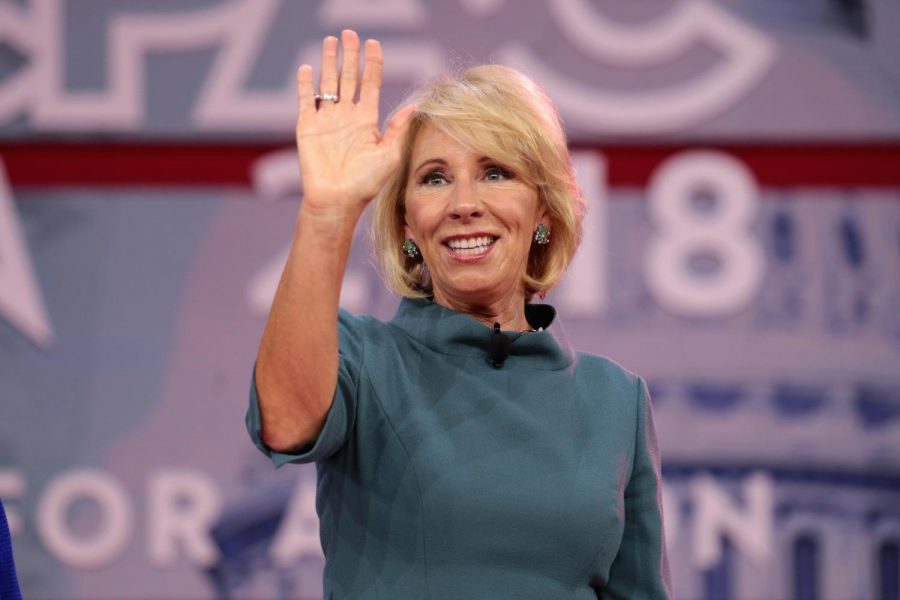 Secretary of Education Betsy DeVos recently amended the federal Department of Education guidelines under Title IX. New changes in Title IX have been adopted by NYU due to pressure of loss of government funding despite ACLU, student, and administrator push back. (Image from Wikimedia Commons, via Gage Skidmore)