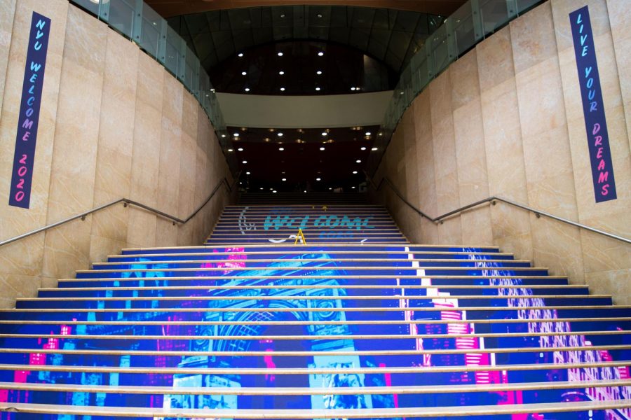 NYU Welcome 2020 signs deck the stairs at NYUs Kimmel Center for University Life during Welcome Week. Although all Welcome Week events have been virtual, Welcome Week leaders found ways to modify the traditional in-person events into a virtual experience for students. (Staff Photo by Jake Capriotti)