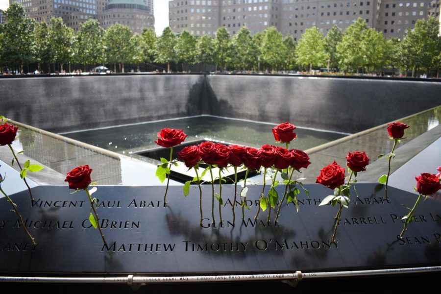 19 years after the national tragedy of September 11 2001, Americans are facing another national crisis — the COVID-19 pandemic. The 9/11 memorial still saw many visitors, albeit masked and somewhat socially distanced. (Staff Photo by Trace Miller)