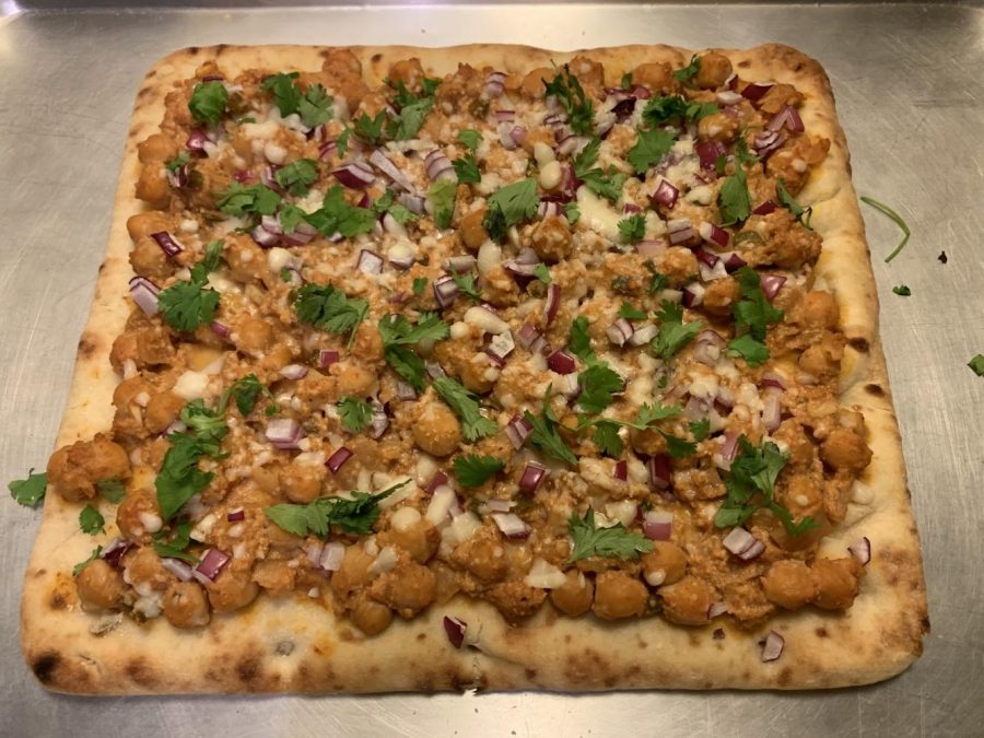 Fusion dishes like chickpea tikka masala flatbread help form Sabrina Choudharys Indian-ish identity. These dishes are authentic but not traditional, just like her experience of Indian culture. (Photo by Sabrina Choudhary)