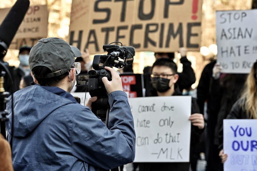 A reporter records footages during the recent protest against Asian hate crimes. (Photo by Sirui Wu)