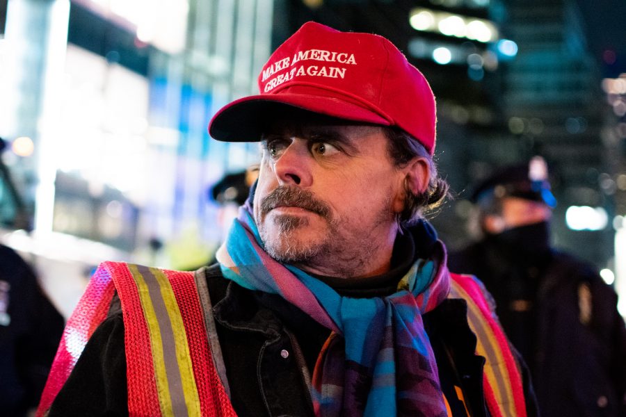A Trump supporter wears a MAGA hat at a midtown rally during the 2020 election. Trumpism has taken over the Republican Party. (Staff Photo by Jake Capriotti)